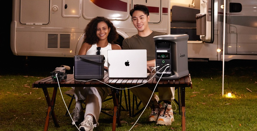 Ampace Andes 1500 used at a campsite with LED lights and a laptop