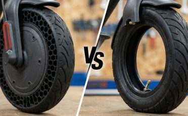 Electric scooter tires comparison Solid vs Pneumatic tires highlighting honeycomb structure and air valve.